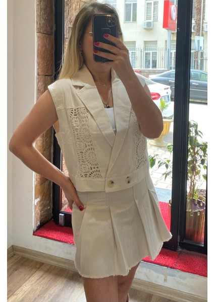 Keten Pileli Arma Detaylı Mini Etek