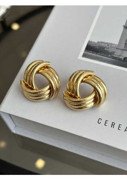Gold Renk Işlemeli Sarmal Model Kadın Küpe indirimleri