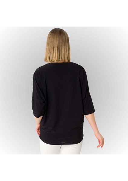 Kadın Siyah Beyaz Önü Blok Parça Desenli Deri Garnili Yarasa Kol Geniş Kesim Bluz indirimleri