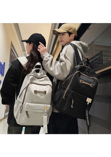 Ortaokul Öğrencilerinin Okul Çantaları, Erkek Üniversite Kampüsü Basit Ortaokul Öğrencilerinin Erkek Kirlenmeye Dayanıklı Büyük Kapasiteli Lise Öğrencilerinin Sırt Çantaları (Yurt Dışından) indirimleri