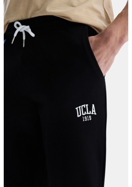 CONNOR Siyah Erkek Lastikli Paça Nakış Detaylı Standard Fit Model Eşofman Altı modelleri