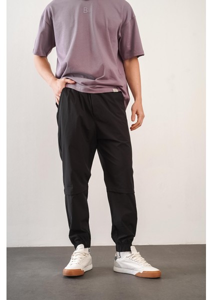 Erkek Relax Fit Kalıp Beli ve Paçası Lastikli Jogger Pantolon