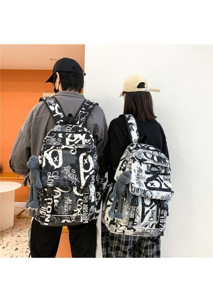 Kurbağa Oyuncaklı Büyük Kapasiteli Doodle Baskılı Okul Çantası (Yurt Dışından) indirimleri