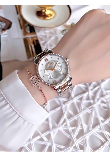Hasır Kordonlu Gümüş/rose Kararmaz Renk Atmaz 3 Atm Özel Tasarım Kadın Kol Saati BFL21262-E modelleri