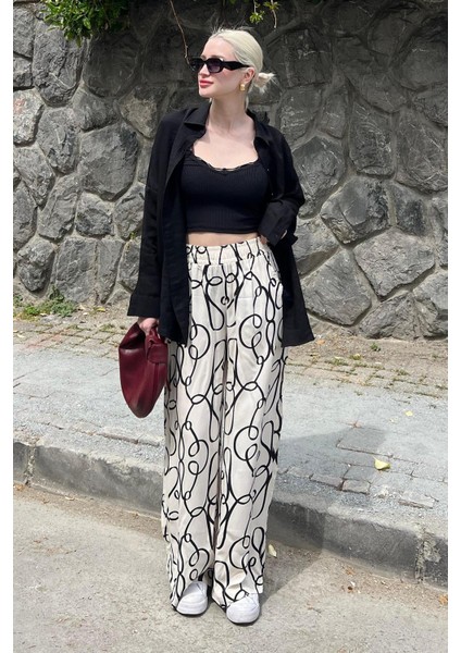 Ekru Desenli Beli Lastikli Bol Paça Pantolon MG2051 fırsatları