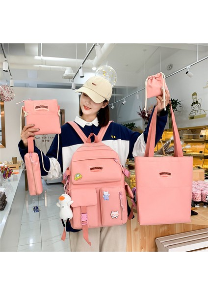 Öğrenci Okul Çantası Dört Parçalı Yeni Kore Moda Naylon Sırt Çantası Kadın Büyük Kapasiteli Sırt Çantası (Yurt Dışından) modelleri