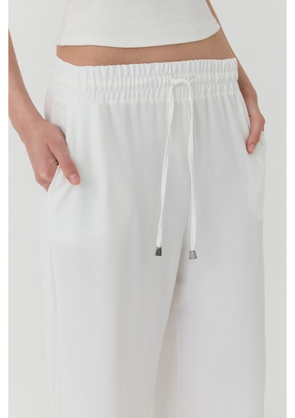 Beli Lastikli Bol Paça Pantolon Beyaz fırsatları
