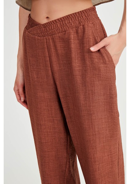 Beli Çapraz Lastik Detaylı Pantolon fiyatları