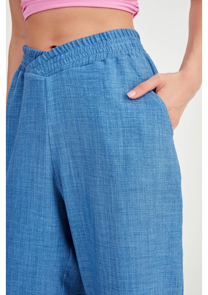 Beli Çapraz Lastik Detaylı Pantolon fiyatları
