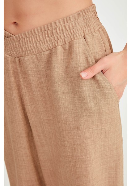Beli Çapraz Lastik Detaylı Pantolon fırsatları