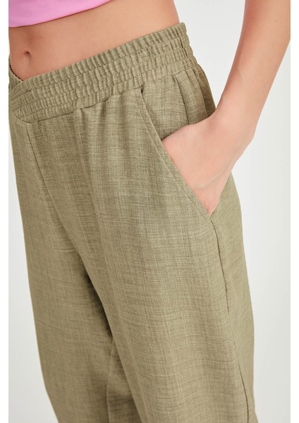 Beli Çapraz Lastik Detaylı Pantolon modelleri