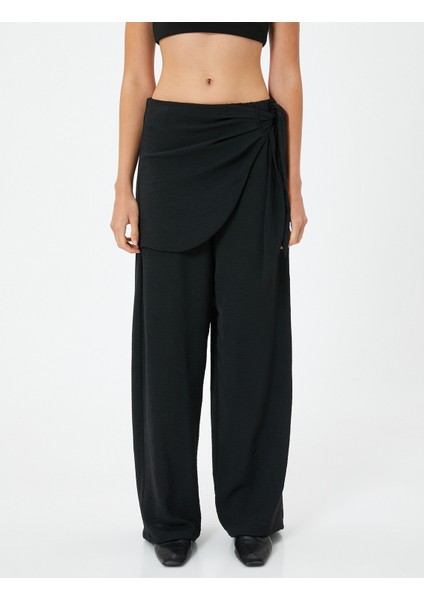 Etekli Pantolon Kruvaze Bağlama Detaylı Bol Paça modelleri
