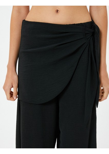 Etekli Pantolon Kruvaze Bağlama Detaylı Bol Paça indirimleri