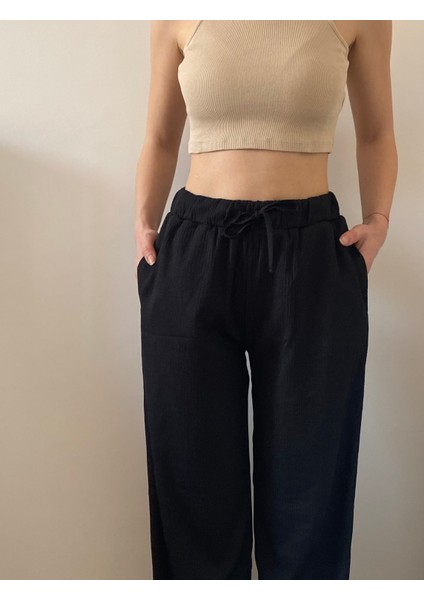 Krinkıl Kumaş Beli Lastlikli Cepli Bağcıklı Pantolon modelleri