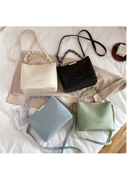 Kadınlar Için Popüler Çantalar 2024 Yeni Moda Moda Zincir Taşınabilir Kova Çantası, Modaya Uygun ve Çok Yönlü Tek Omuz Çapraz Vücut Çapraz Sınır Çantası (Yurt Dışından) modelleri