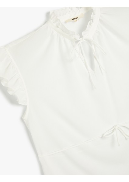 Fiyonk Detaylı Bluz Fırfırlı Kısa Kollu modelleri