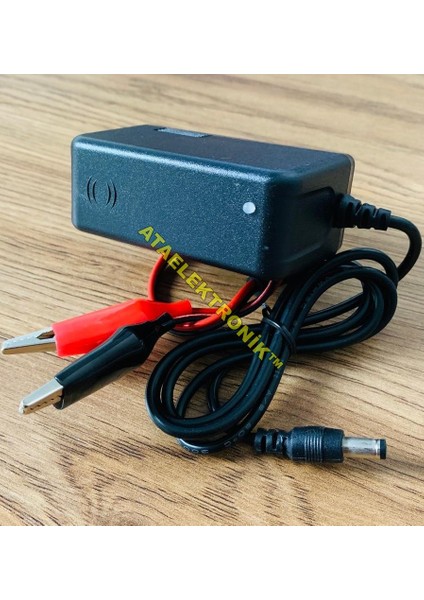 Ata Elektronik Kaliteli Arayanlara - Pilsan Uyumlu 12 Volt Akü Şarj Cihazı 1 Amper Charger Kesicili LED Işıklı ( Şarjda Kırmızı Dolunca Yeşil ) Timsah Maşalı Kablolu Çıkış Voltajı  13.8V