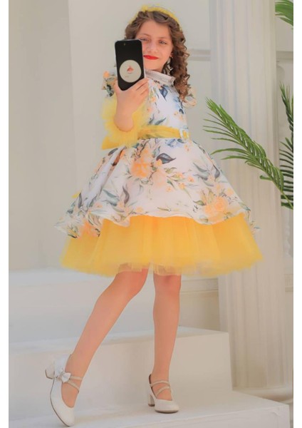 Kız Çocuk Üzeri Çiçek Desenli Omuzu ve Kolları Fırfır Detaylı Taş Işlemeli Sarı Elbise modelleri