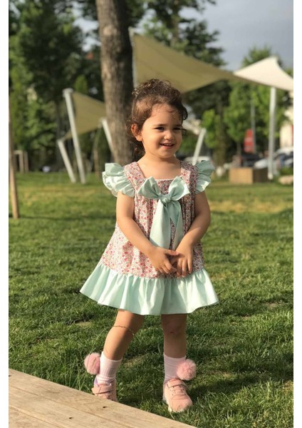 Fırfır ve Fiyonk Detaylı Petek Desenli Kız Çocuk Bebek Renkli Tasarım Elbise