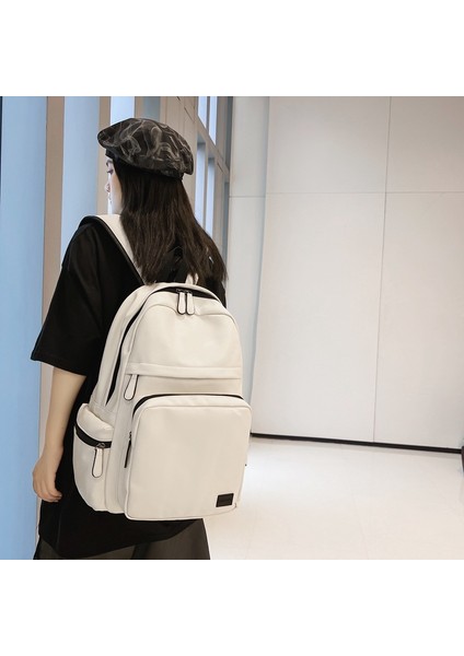 Sırt Çantası Büyük Kapasiteli Seyahat Eğlence Düz Renk Pu Bilgisayar Sırt Çantası Moda Erkek ve Kadın Öğrencilerin Okul Çantası (Yurt Dışından) fiyatları