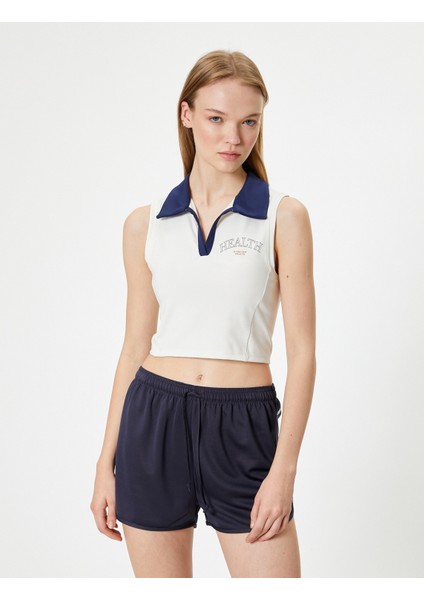 Crop Spor Atlet Slogan Baskılı Polo Yaka Kolsuz Slim Fit modelleri