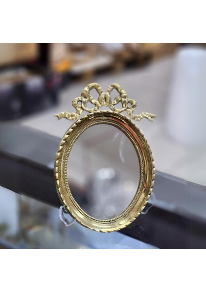 Pirinç Ayna Oval Fiyonklu Dikey 17CM. fiyatları