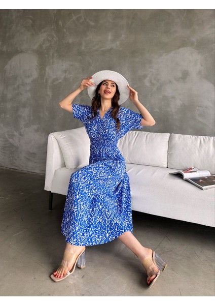 Kadın Kruvaze Yaka Lastikli Bel Desenli Gipeli Viskon Elbise fiyatları