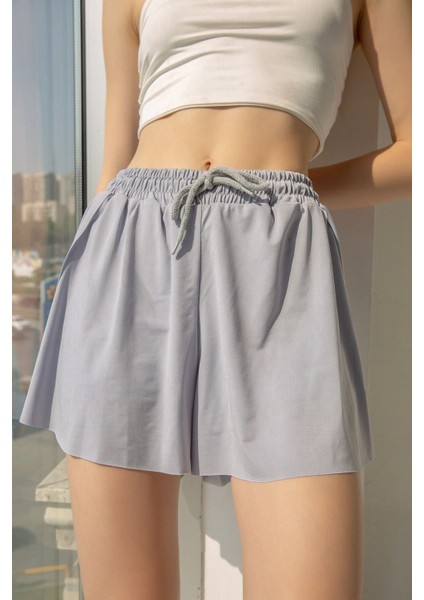 Bol Kesim Taytlı Spor Şort