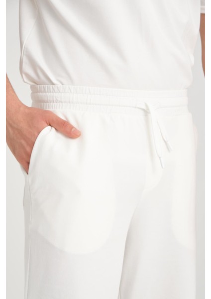 İki İplik Pamuklu Duble Kol Yırtmaçlı T-Shirt Şort Takım - Ekru fiyatları