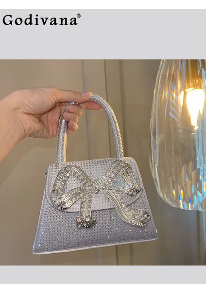 Göl Mavi Retro Moda Kore Tarzı Metal Yay Kadın Eyer Çanta Bayanlar Için Tatlı Sevimli Zarif Elmas Metal Dekoratif Postacı Çantaları (Yurt Dışından) fiyatları