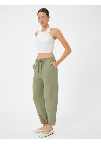 Havuç Pantolon Beli Bağcıklı Normal Bel Cep Detaylı Modal fiyatları