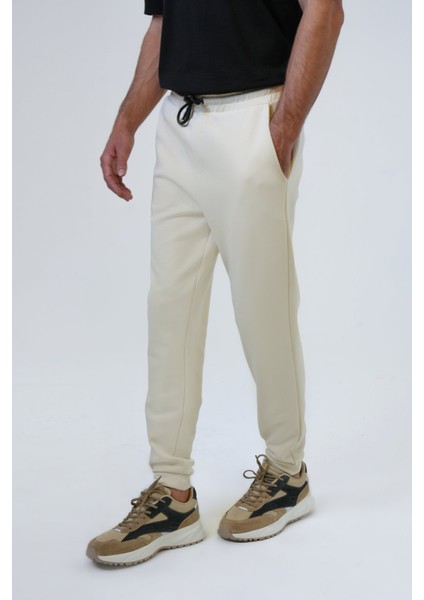 Bej Regular Fit Pamuklu Beli Bağcıklı Jogger Pantolon fiyatları