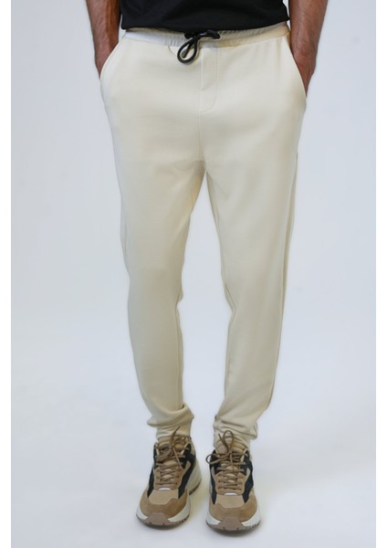 Bej Regular Fit Pamuklu Beli Bağcıklı Jogger Pantolon modelleri
