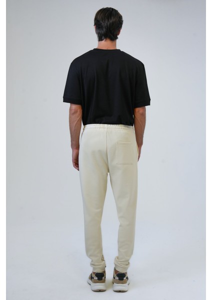 Bej Regular Fit Pamuklu Beli Bağcıklı Jogger Pantolon fırsatları