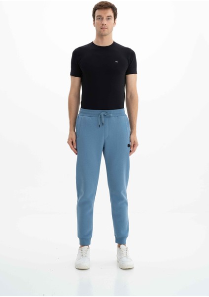 Erkek Regular Fit Cepli Arka Cep Fermuarlı Basic 3 İplik Şardonlu Dar Paça Lastikli Eşofman Altı K26174680001
