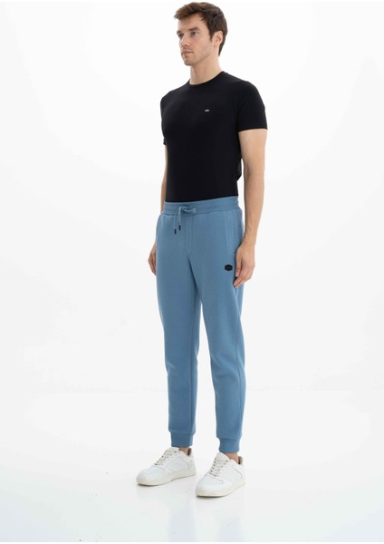 Erkek Regular Fit Cepli Arka Cep Fermuarlı Basic 3 İplik Şardonlu Dar Paça Lastikli Eşofman Altı K26174680001