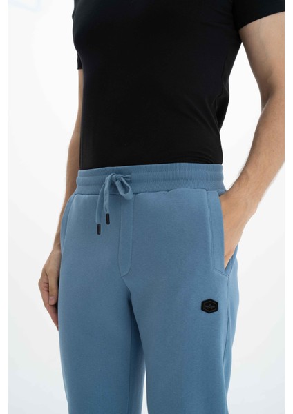 Erkek Regular Fit Cepli Arka Cep Fermuarlı Basic 3 İplik Şardonlu Dar Paça Lastikli Eşofman Altı K26174680001