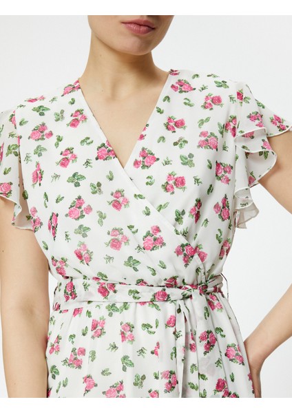 Midi Çiçekli Elbise Şifon Fırfırlı Beli Kuşaklı Asimetrik Kesim V Yaka indirimleri