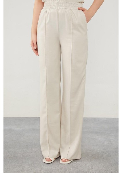 Taş Asimetrik Kesim Balon Kol Pantolonlu Takım indirimleri