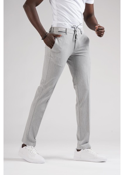 Slimfit Beli Yarım Lastikli ve Iplikli Ince Çizgili Yazlık Jogger Pantolon fiyatları