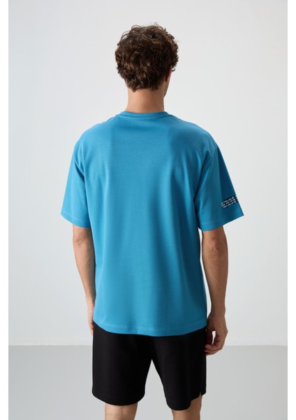 Petrol Mavi Pamuklu Kalın Yüzeyi Dokulu Oversize Fit Baskılı Erkek T-Shirt - 88369 indirimleri