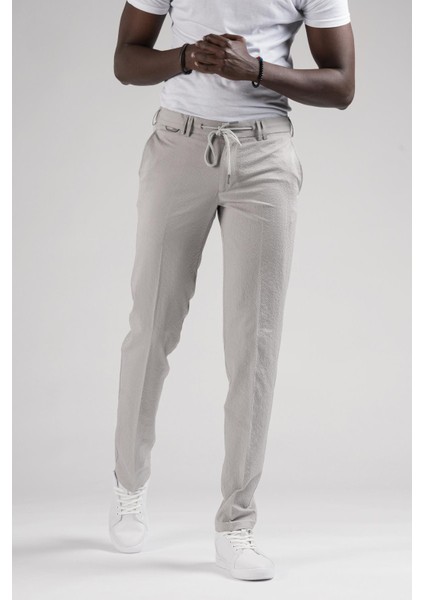 Slimfit Beli Yarım Lastikli ve Iplikli Gofre Kumaş Yazlık Jogger Pantolon modelleri