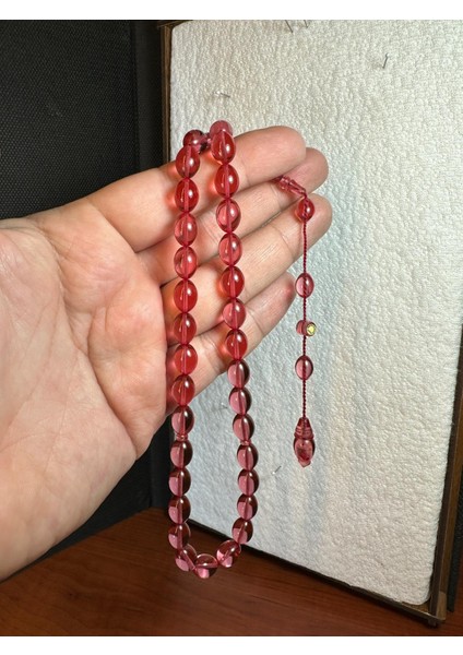 Ateş Kehribar Tesbih Pembe Renkli Şeffaf Beyzi Kesim 7mm x 11 mm T-267 fiyatları