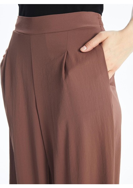 Lcwaıkıkı Classic Beli Lastikli Düz Geniş Paça Kadın Pantolon fiyatları