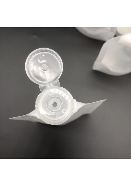 50ML Tarzı ml Losyon Dağıtıcı Çanta Seyahat Yeniden Kullanılabilir Sızdırmaz Doldurulabilir Çanta Şampuan Sıvı Kozmetik Ambalaj Depolama Kap Behçet. (Yurt Dışından) fırsatları