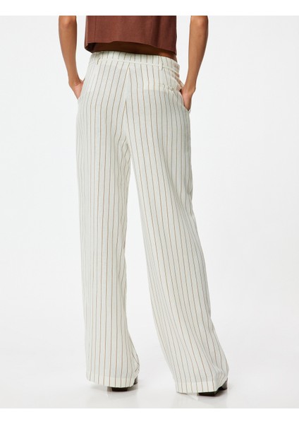 Bol Paça Pantolon Keten Karışımlı Beli Bağcıklı Cepli fırsatları