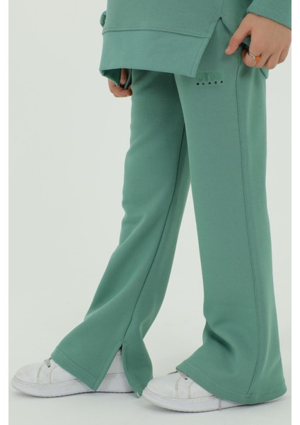 Bisiklet Yakalı Yırtmaçlı Ispanyol Paça Baskı Detaylı Pamuklu 2'li Alt Üst Kız Eşofman Takımı indirimleri