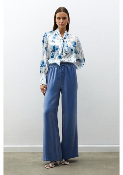 Bel Lastikli Parlak Pantolon - Mavi