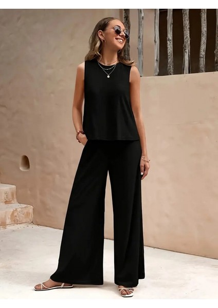 Kadın Kolsuz Bluz ve Bol Paça Pantolon Bürümcük Kumaş Ikili Takım modelleri