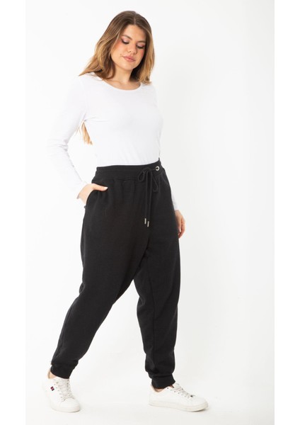 Kadın Büyük Beden Siyah Kuşgözü Bağcıklı Bel ve Paçası Ribanalı Eşofman Pantolon 65N37398 fırsatları